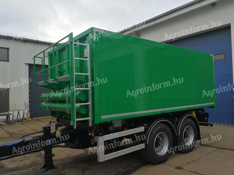 Tipping platform, 2-compartment crop and feed trailer with blower discharge