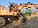 Fiat-Kobelco EX135W + Rototilt gumikerekes kotró