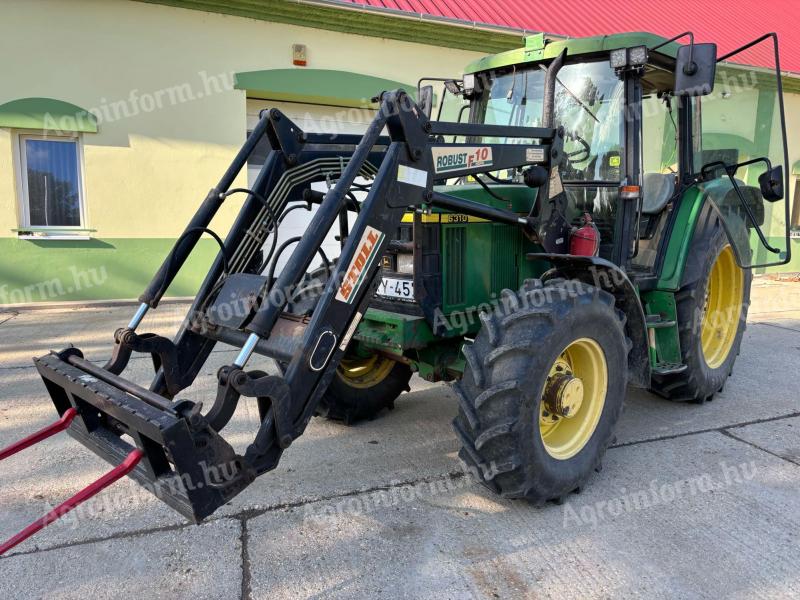 John Deere 6310 SE homlokrakodóval