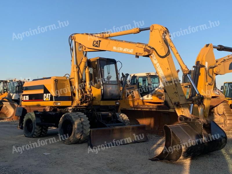 Caterpillar M315 gumikerekes kotró