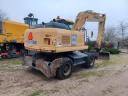 Komatsu PW180-7 típusú gumikerekes forgókotró