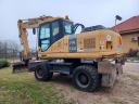 Komatsu PW180-7 típusú gumikerekes forgókotró