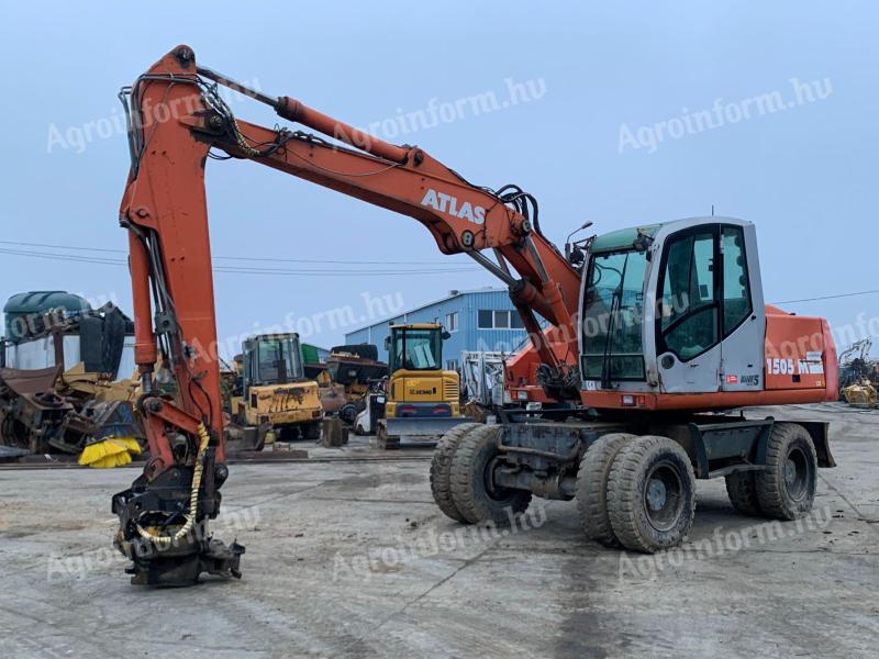 Atlas 1505M + Engcon Rototilt gumikerekes kotró