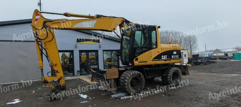 Caterpillar M313C gumikerekes forgókotró