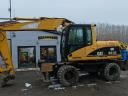 Caterpillar M313C gumikerekes forgókotró