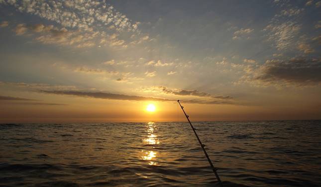 Horgászat a naplementében.